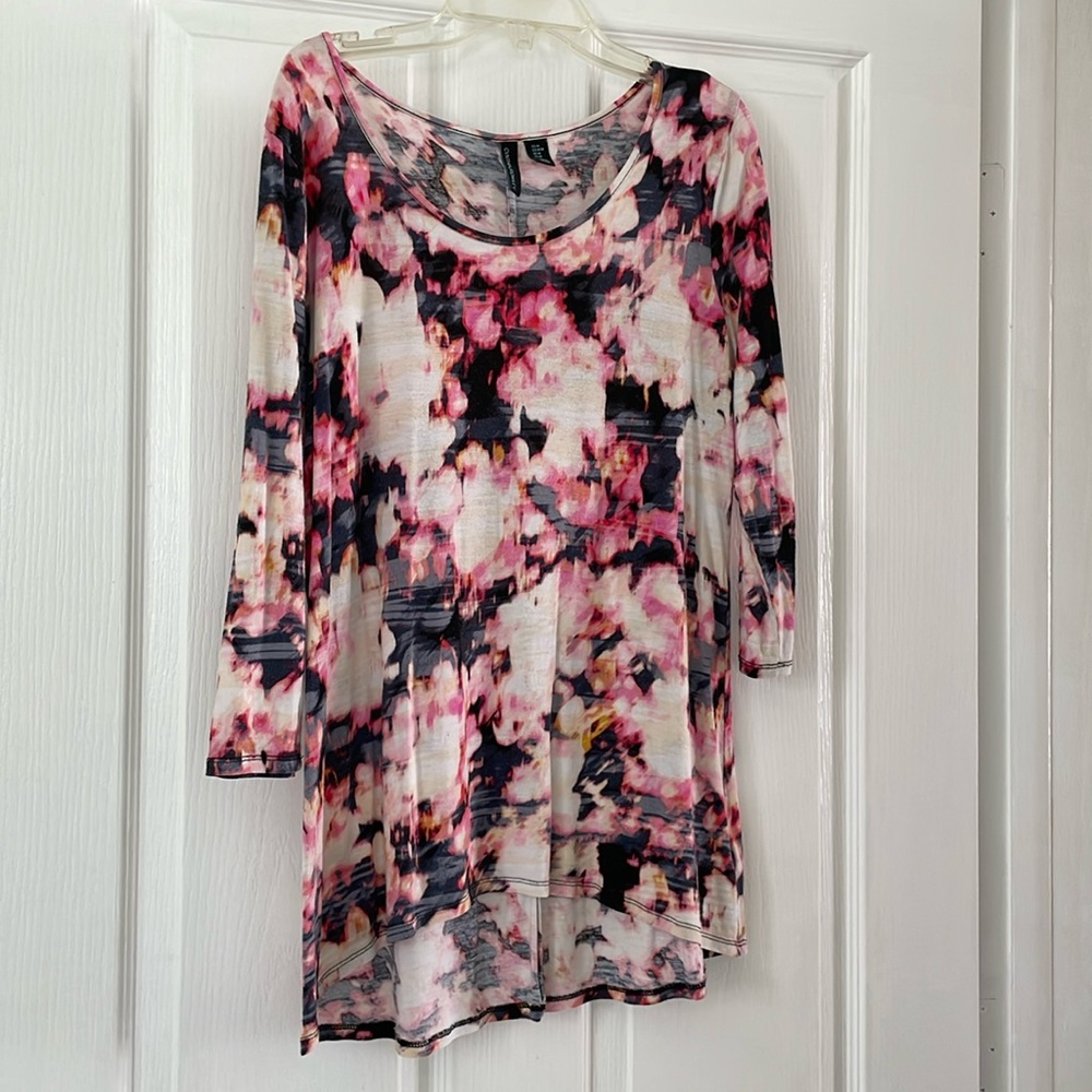 Colorful , goes to hips with 3/4 sleeves